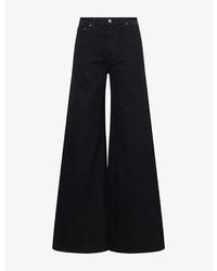 KHAITE - Dane Wide-Leg Cotton-Blend Denim Jeans - Lyst