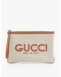 Gucci - Logo-print Leather-trim Canvas Clutch - Lyst