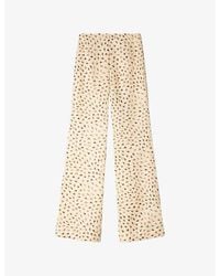 Sandro - Floral-Print Flared Woven Trousers - Lyst