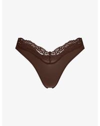 Skims - Fits Everybody Lace-Trimmed Stretch-Woven Thong - Lyst