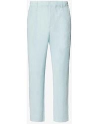 Homme Plissé Issey Miyake - Color Pleats Elasticated-waistband Tapered-leg Regular-fit Knitted Trouser - Lyst