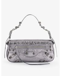 Balenciaga - Le Cagole Small Stud-embellished Metallic-leather Shoulder Bag - Lyst
