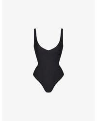 Skims - Plunge-Neck Thong Stretch-Woven Bodysuit - Lyst
