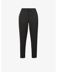 Spanx - Tapered Mid-Rise Stretch-Jersey Jogging Bottoms - Lyst