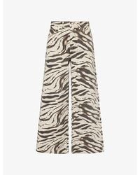 Ganni - Lari Zebra-Print Wide-Leg Cotton Denim Jeans - Lyst