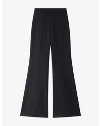 Sandro - Striped Flared-Leg High-Rise Wool-Blend Trousers - Lyst