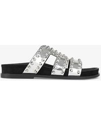 Sandro - Rivet-embellished Metallic Flat Leather Sandals - Lyst