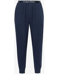 Calvin Klein - Branded-waistband Tapered-leg Stretch Cotton-blend jogging Bottoms - Lyst