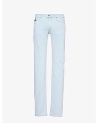 Versace - Five-pocket Brand-plaque Slim-fit Low-rise Stretch-denim Blend Jeans - Lyst