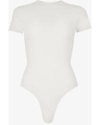 Skims Round-neck Stretch-cotton Jersey Body in Bone Womens Clothing Lingerie Bodysuits White 