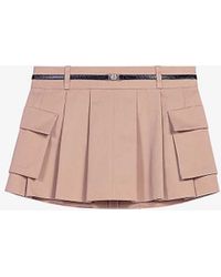 Maje - Buckle-embellished Mid-rise Pleated Cotton Mini Skirt - Lyst