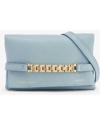 Victoria Beckham - Chain-embellished Mini Leather Pouch Bag - Lyst