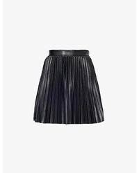 IKKS - Pleated Faux-leather Mini Skirt - Lyst