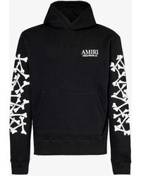 Amiri - Bones Brand-print Cotton-jersey Hoody - Lyst