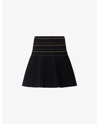 Sandro - Stud-Embellished Flared Knitted Mini Skirt - Lyst