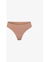 Skims - Smoothing Mid-rise Stretch-woven Thong Xxx - Lyst