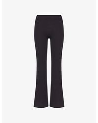 NikeSKIMS - Matte High-Waisted Slim-Flared Workout Leggings - Lyst