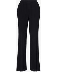 Stella McCartney - Ruffle-trim Elasticated-waist Straight-leg Mid-rise Knitted Trousers - Lyst
