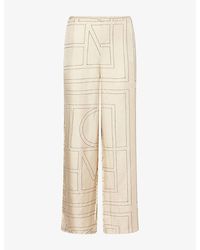 TOTEME - Monogram-Print Silk-Twill Pyjama Bottoms - Lyst