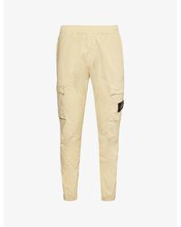 Stone Island - Tural Beige Logo-badge Tapered-leg Stretch-cotton Cargo Trousers - Lyst
