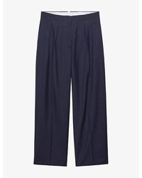 Prada - Tapered-Leg Mid-Rise Wool-Blend Trousers - Lyst