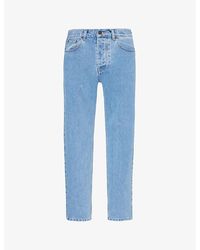 Carhartt - Newel Brand-patch Tapered-leg Relaxed-fit Organic-cotton Jeans - Lyst