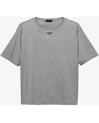 Prada - Brand-plaque Oversized-fit Cotton-jersey T-shirt - Lyst