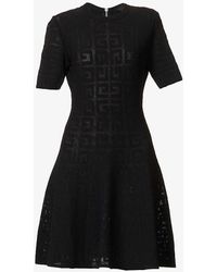 Givenchy - Monogram-embossed Flared-skirt Knitted Mini Dres - Lyst