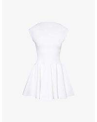 Alaïa - Skater Pleated Knitted Mini Dress - Lyst