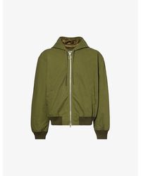 Acne Studios - Padded Relaxed-fit Cotton-canvas Hooded Bomber Jacket - Lyst