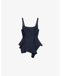 KHAITE - Loa Peplum Linen Top - Lyst