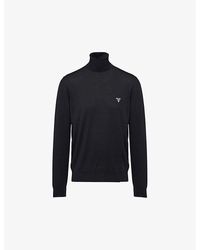 Prada - Logo-Print Turtleneck Wool Jumper - Lyst