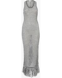 Alaïa - Asymmetric-hem Slim-fit Knitted Maxi Dress - Lyst