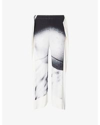 Issey Miyake - Study Pleats Asymmetric-Cuffs Knitted Trousers - Lyst