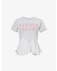 Conner Ives - Graphic-print Peplum-hem Cotton-blend Jersey T-shirt - Lyst