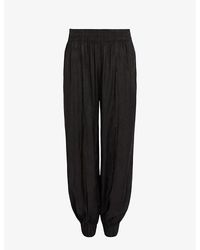 AllSaints Tyler Wide-leg High-rise Stretch Recycled-velvet Trousers in ...