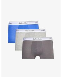 Calvin Klein - Branded-waistband Mid-rise Pack Of Three Stretch-cotton Trunks X - Lyst