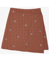Sandro - Crystal-embellished Wrap-around Knitted Mini Skirt - Lyst