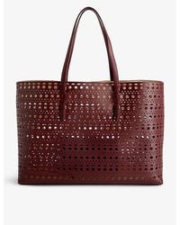 Alaïa - Mina Cut-out Leather Top-handle Bag - Lyst