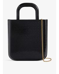 Saint Laurent - All Over Logo-embossed Leather Tote Bag - Lyst