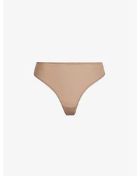 Skims - Mid-Rise Stretch Thong - Lyst
