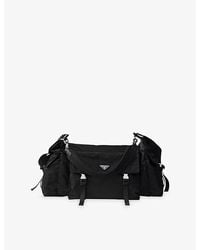 Prada - Explore Re-Nylon And Leather Duffel Bag - Lyst