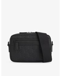 Gucci - Monogram-debossed Leather Cross-body Bag - Lyst