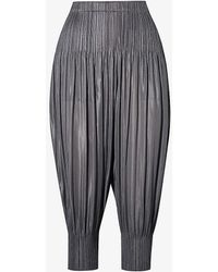 Pleats Please Issey Miyake - Pleated Tapered-leg Mid-rise Knitted Trousers - Lyst