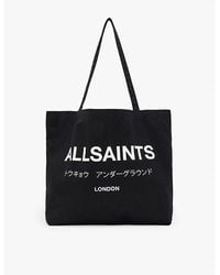 AllSaints - Underground Logo-Print Cotton Tote Bag - Lyst