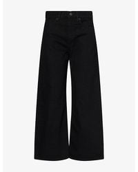 FRAME - The Bow Crop Curved-Leg Denim Jeans - Lyst