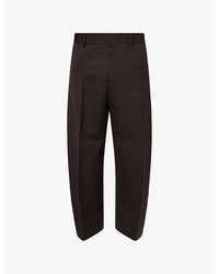 Studio Nicholson - Fume Curved-Leg Cotton-Blend Trousers - Lyst