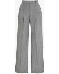 BOSS - X Naomi Campbell Pinstriped Wide-leg High-rise Wool Trousers - Lyst