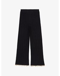Maje - Charm-Embellished Knitted Cotton-Blend Trousers - Lyst