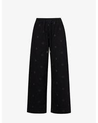 Honor The Gift - Crest Brand-print High-rise Relaxed-fit Cotton-jersey jogging Bottoms - Lyst